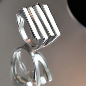 Justerbar Firkantet Trinring