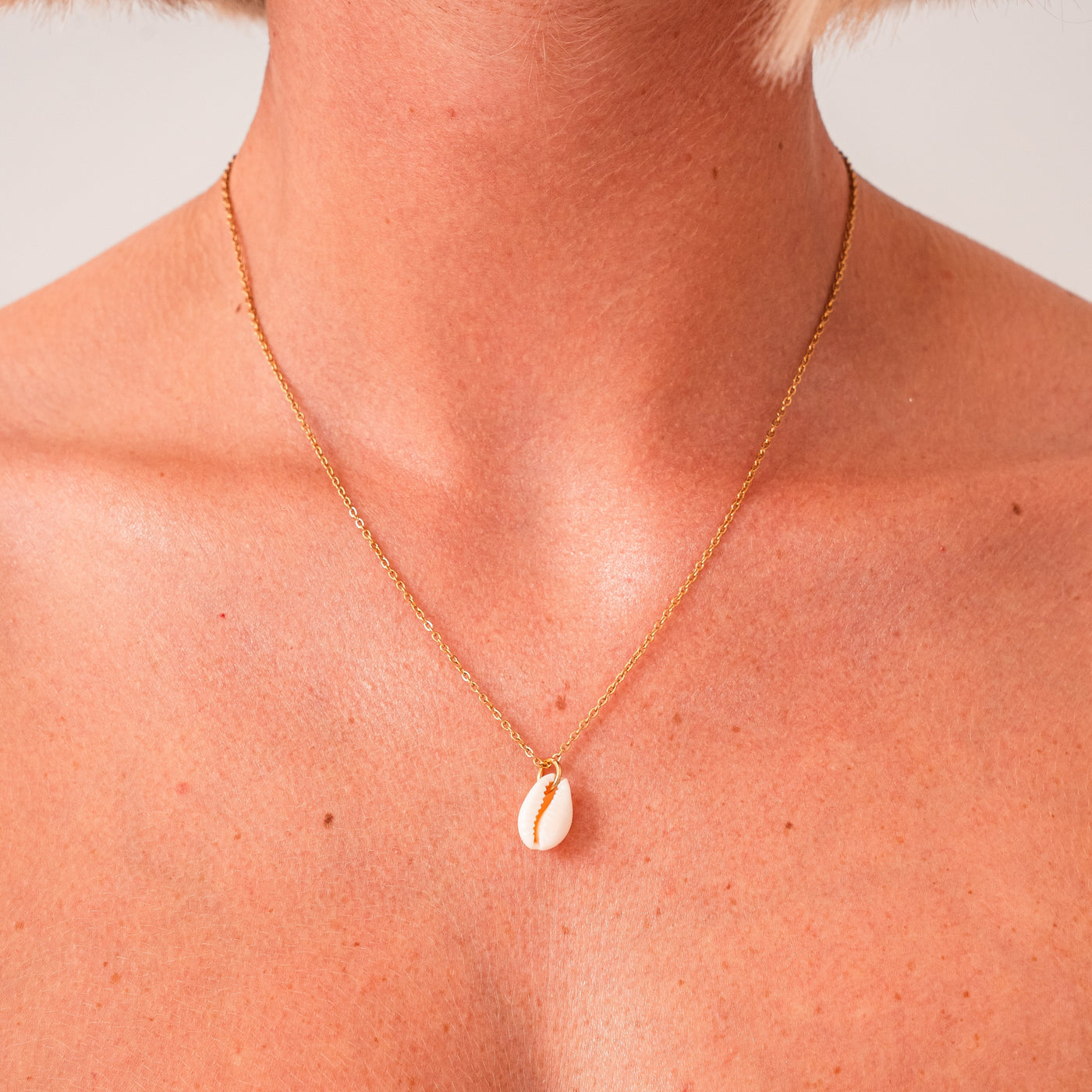 Kauri-skalle (guld)