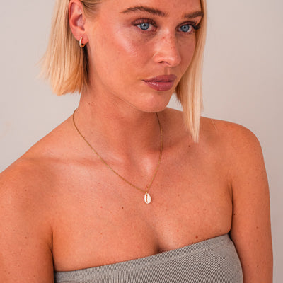 Kauri-skalle (guld)