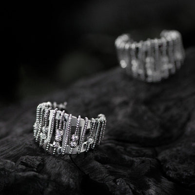 Gennembrudt, perlebesat, justerbar ring
