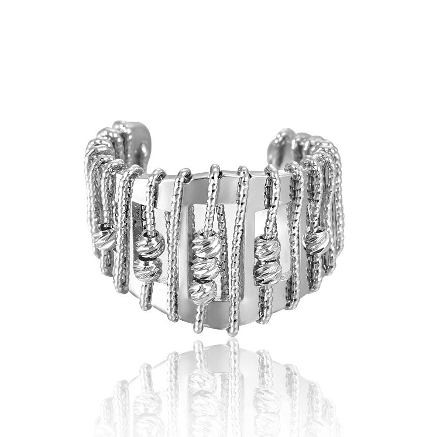 Gennembrudt, perlebesat, justerbar ring