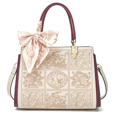 sylvia™ – unik crossbody med broderi og sløjfedetalje